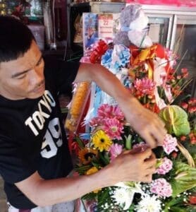 Jack making a flower arrangement