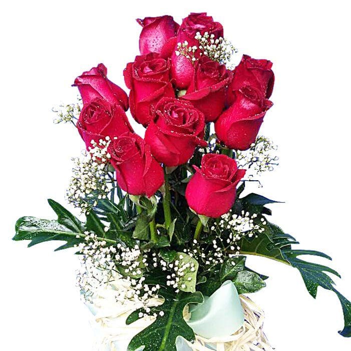 Red Roses in tall vase close