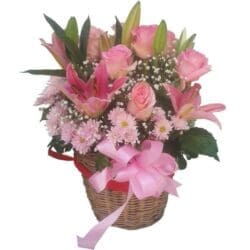 Lilies mixed with Roses & Chrysanthamums in a basket