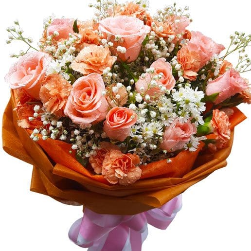 Peach Roses & Carnations in a bouquet close