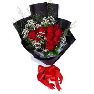 Red Roses in a Black Wrap Bouquet