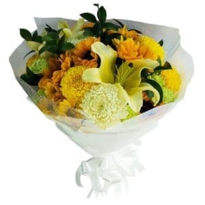 A large bouquet of mixed seasonal blooms of yellow and white